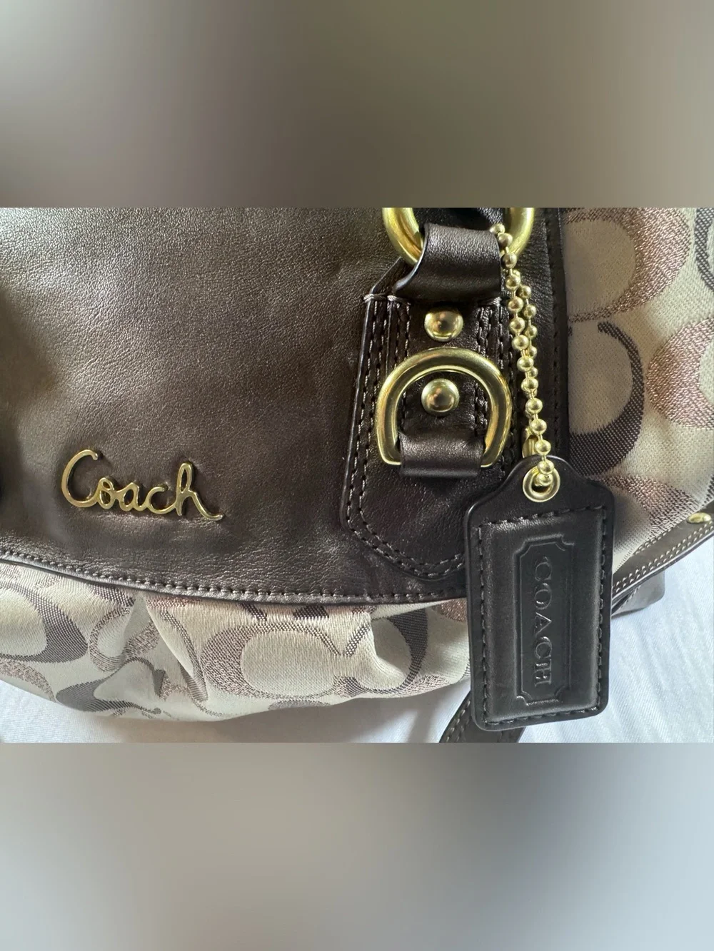 Coach Metallic Signature Ashley With Gold Hardware.